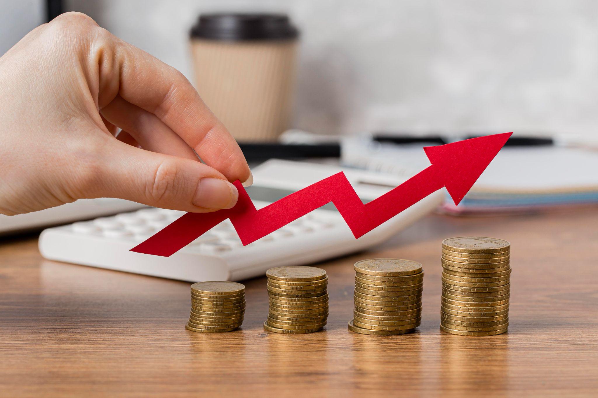  An increasing arrow of growth over multiple stacks of coins