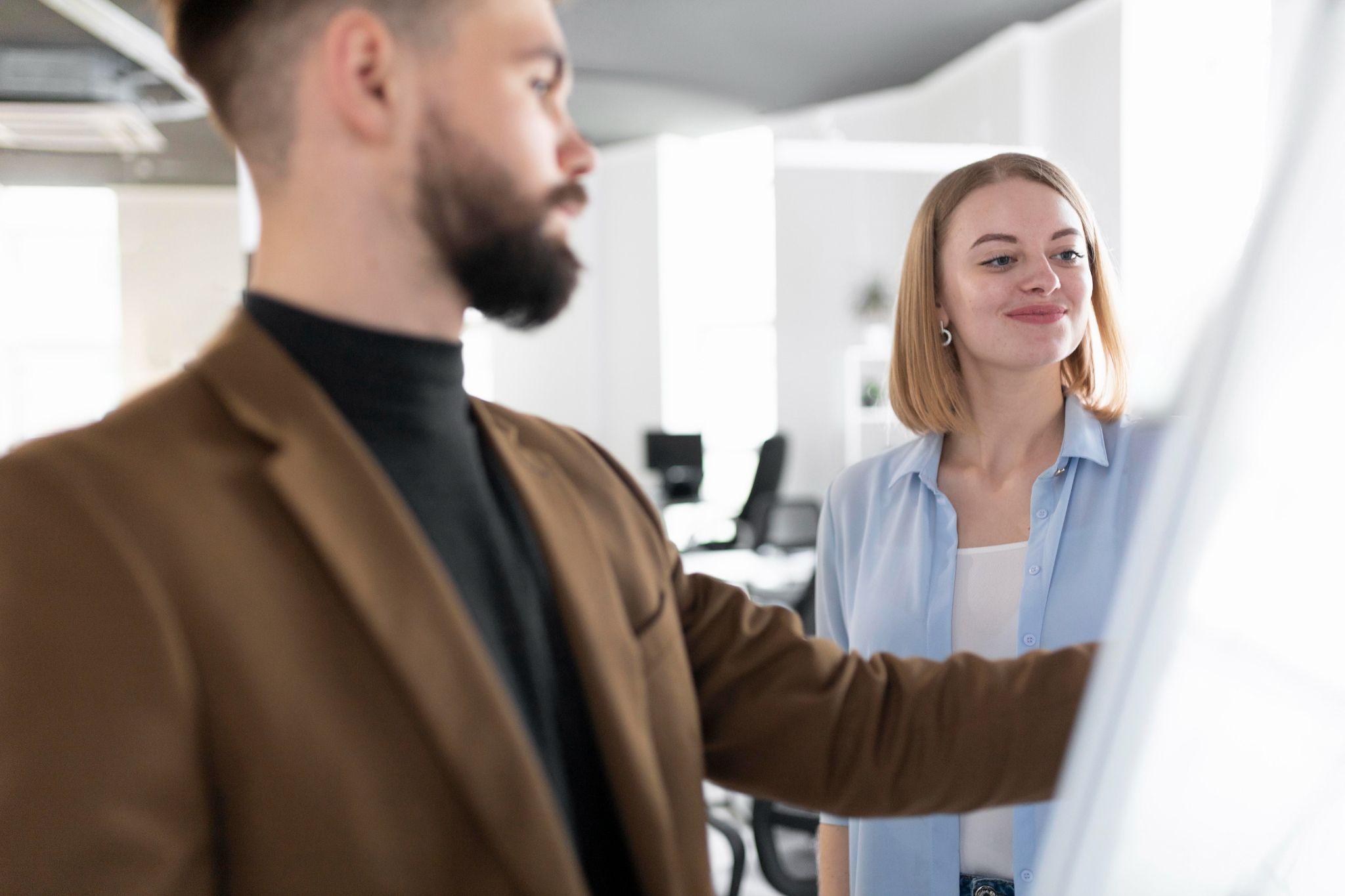 A sales coach providing personalized training to an employee 