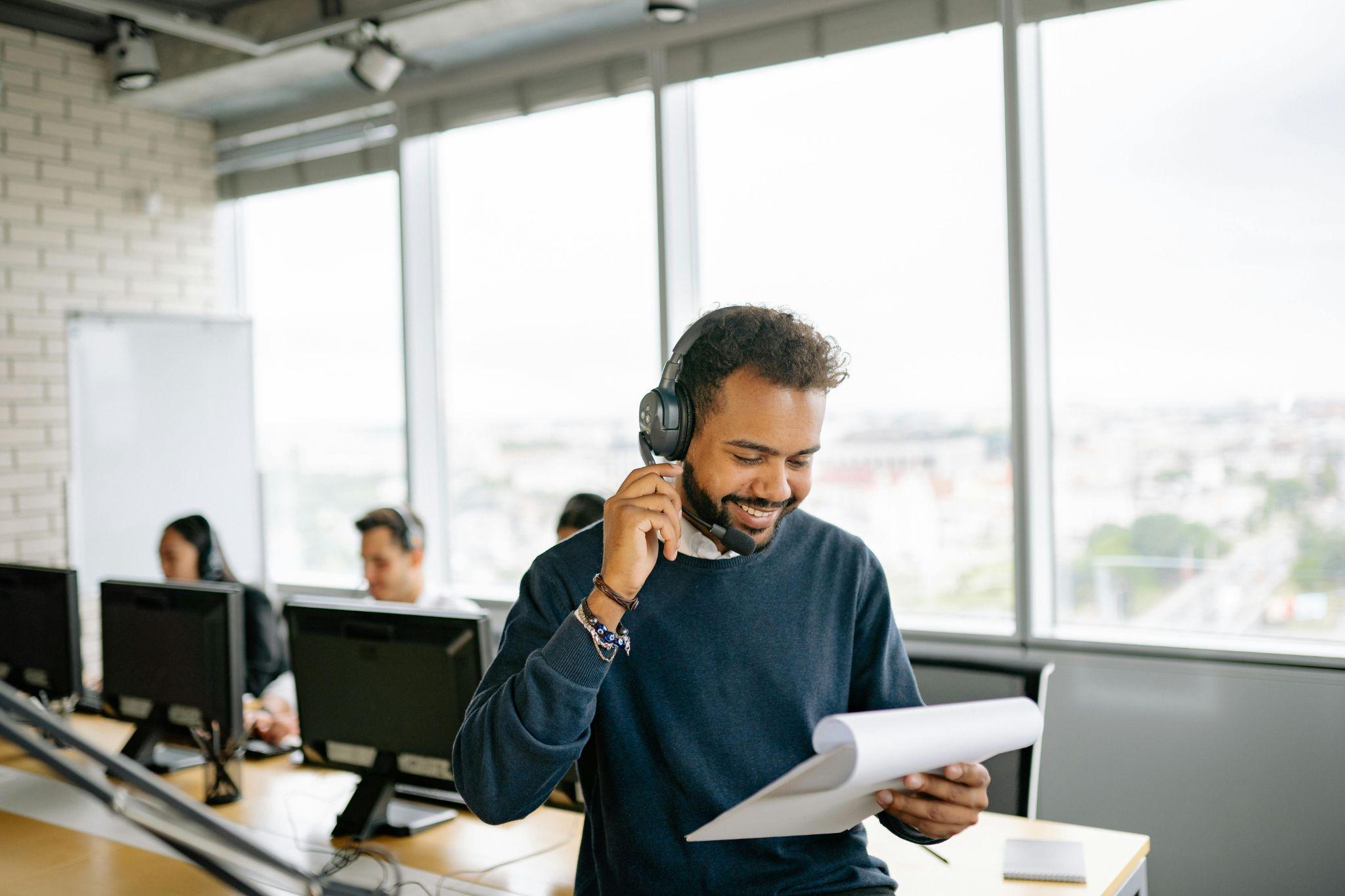 A sales team member confidently making a pitch to a client.