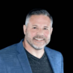 Business coach helping entrepreneurs break revenue ceiling
