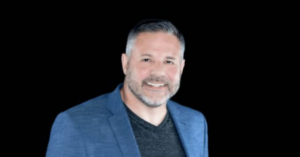 Business coach helping entrepreneurs break revenue ceiling